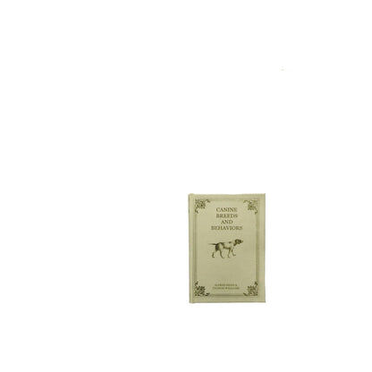 beige book box titled 'canine breeds and behaviors' with the image of a dog on it