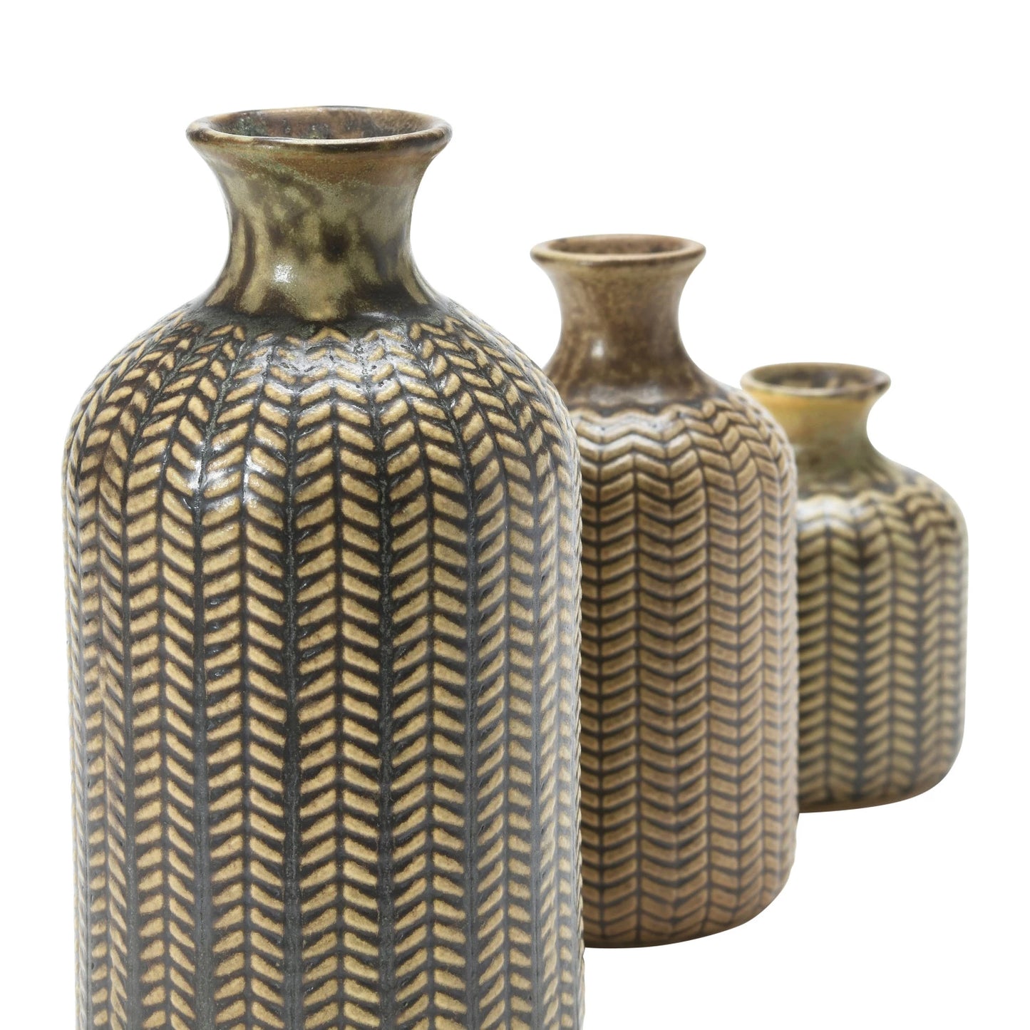 close-up of stoneware vase showing embossed pattern.