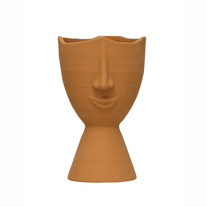 narrow terracotta planter with face displayed against a white background