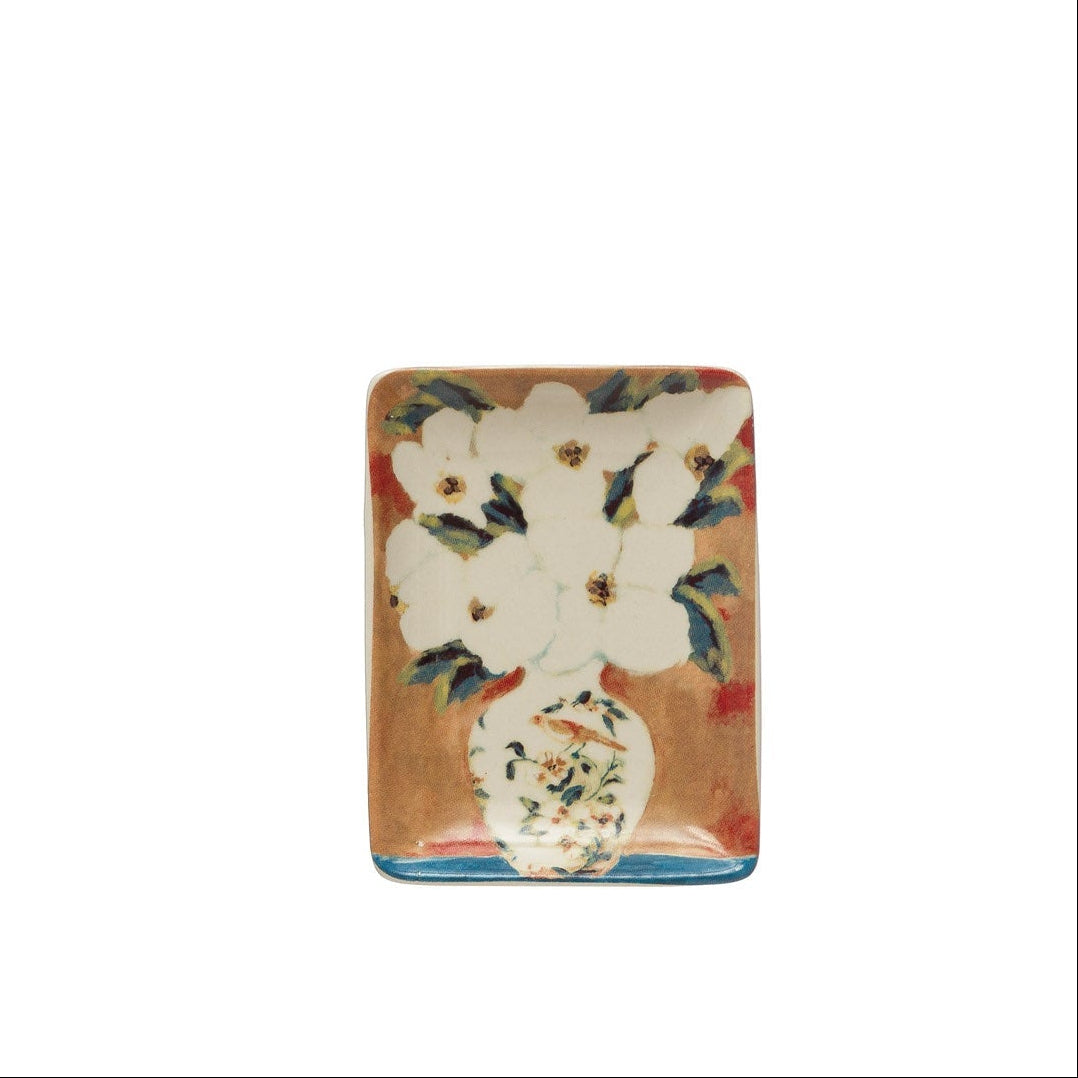 small rectangular dish with image of white flowers in a white vase