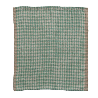 aqua linen napkin laying flat on a white background