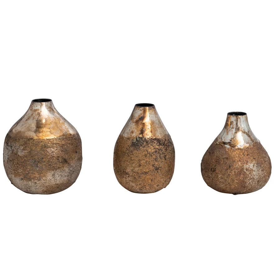 all three sizes of burnt gold metal vases displayed against a white background