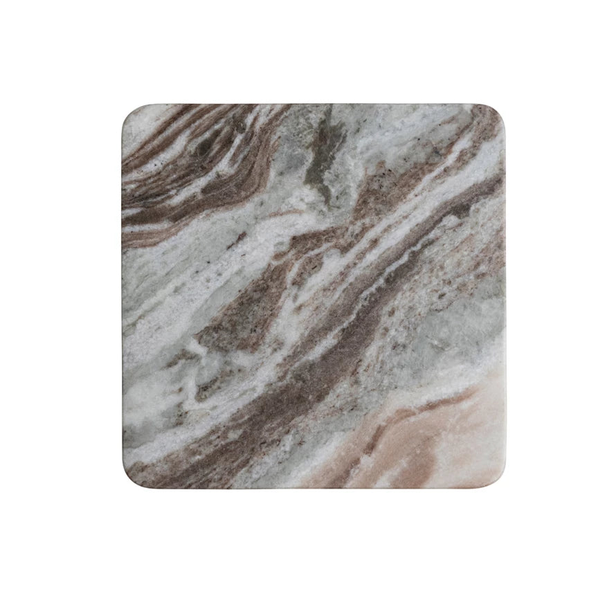 top view of marble with brown, grey, and white veining.
