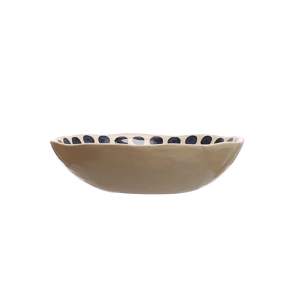 side view of cream oclored bowl.