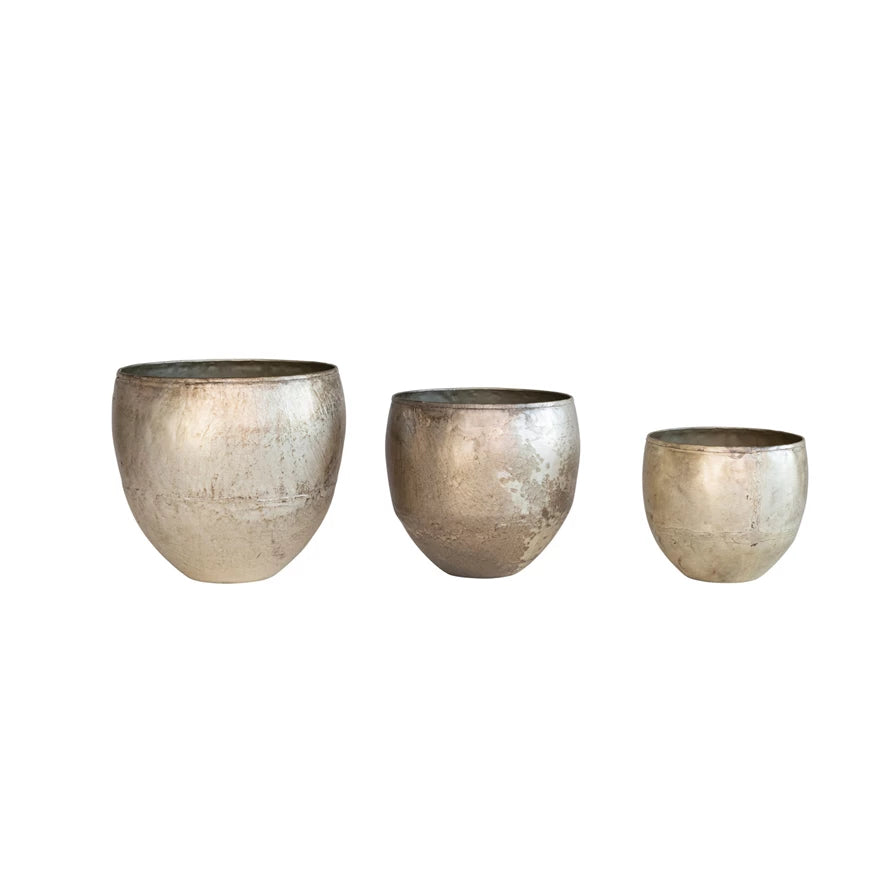 all three sizes of distressed pewter finish metal planters displayed against a white background
