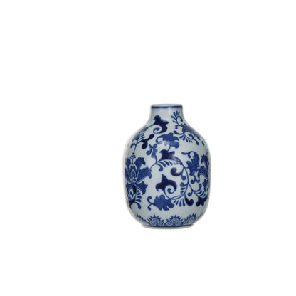 largest white vase with blue vining floral pattern on it