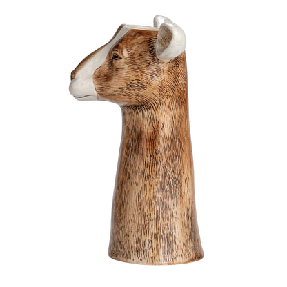 side view of goat vase