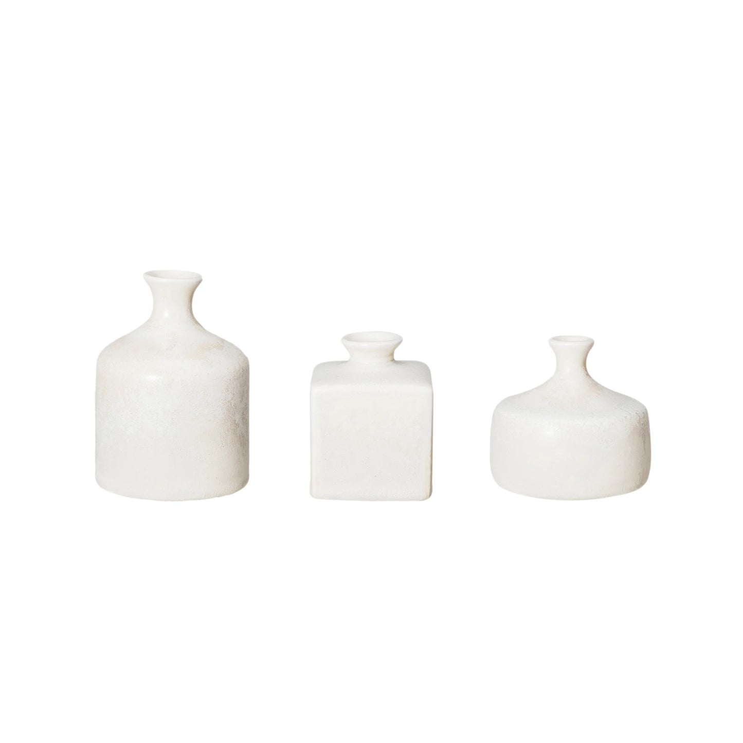 3 styles and sizes of vases in a row on a white backgorund.