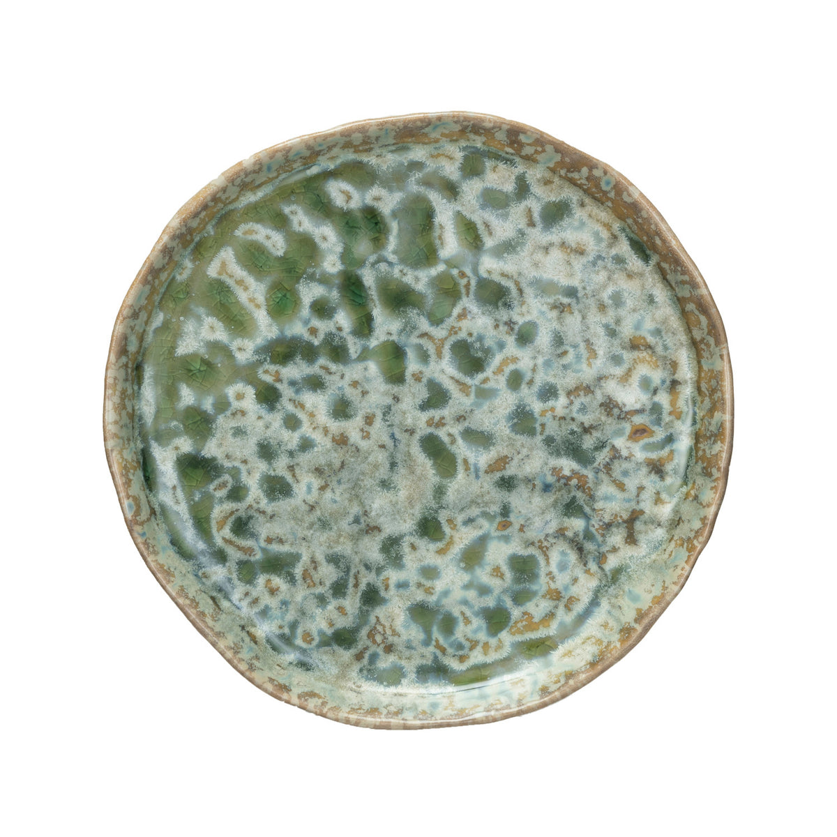 Ceramic plate with green and blue glaze on a white background