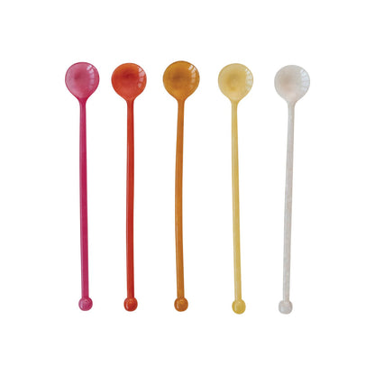Resin Cocktail Spoons in five different colors in a row on a white background