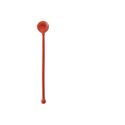coral long spoon shown on a white background