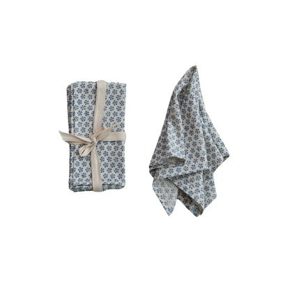 napkin set next to a slightly folded napkin