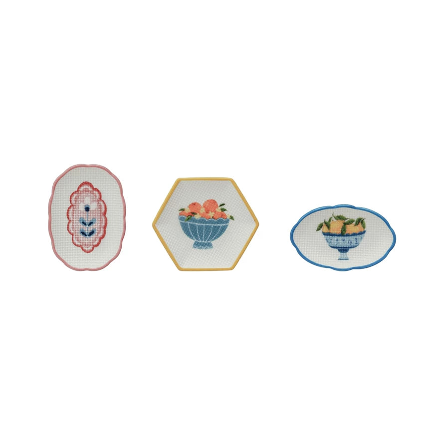 3 style of little dishes in a row on a white background