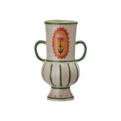 off-white large handled urn with green stripes and a pink flower painted on it.