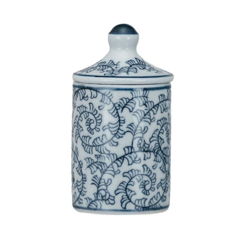 white jar with blue swirling vine pattern.