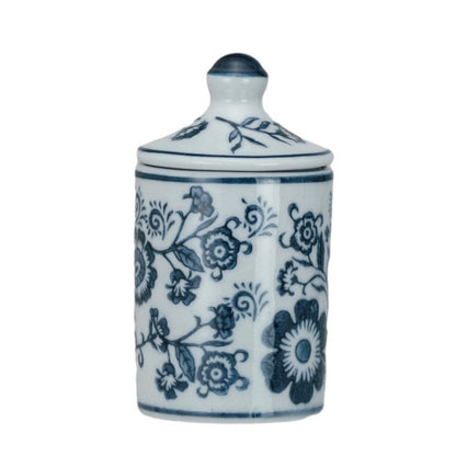 white jar with blue floral pattern.