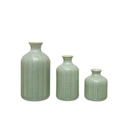 3 sizes of stoneware vase in a row on a white background.