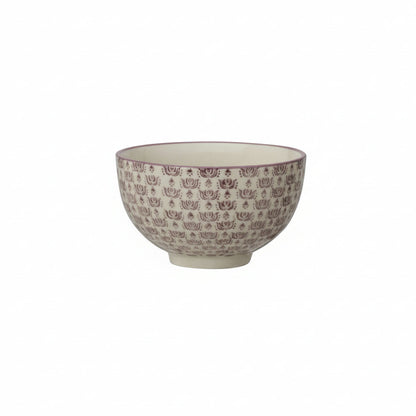 Ceramic bowl with decorative purple pattern on a white background