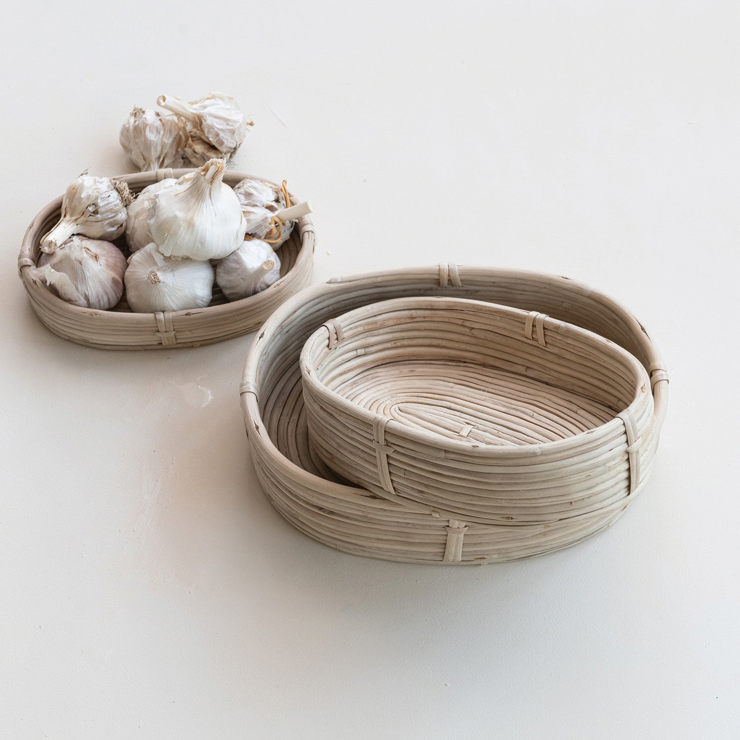 3 oval baskets on a decorated setting