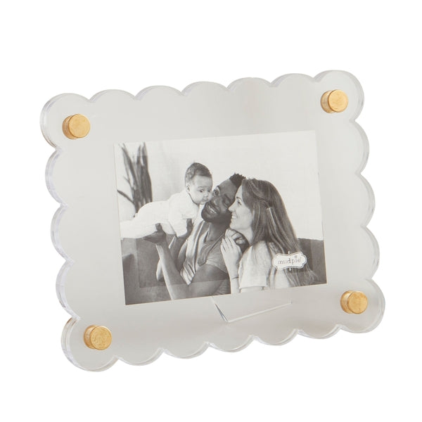 rectangular acrylic photo frame with black and white image of a family in it