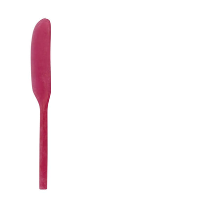 bright pink marbled resin spreader on a white background
