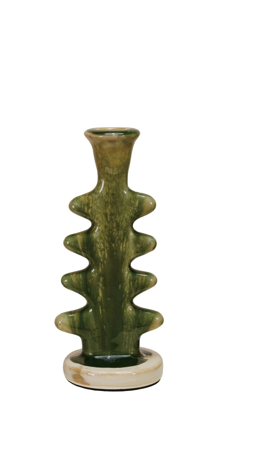 green Ceramic candle holder with a textured design on a white background