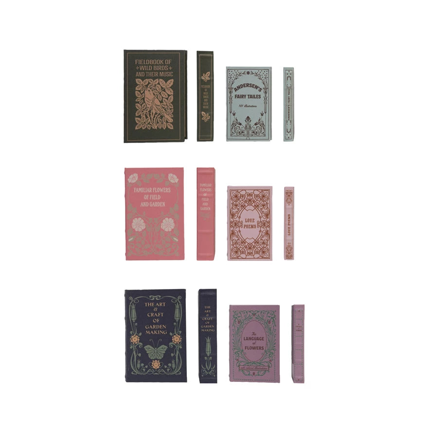 assorted book boxes arranged on a white background.