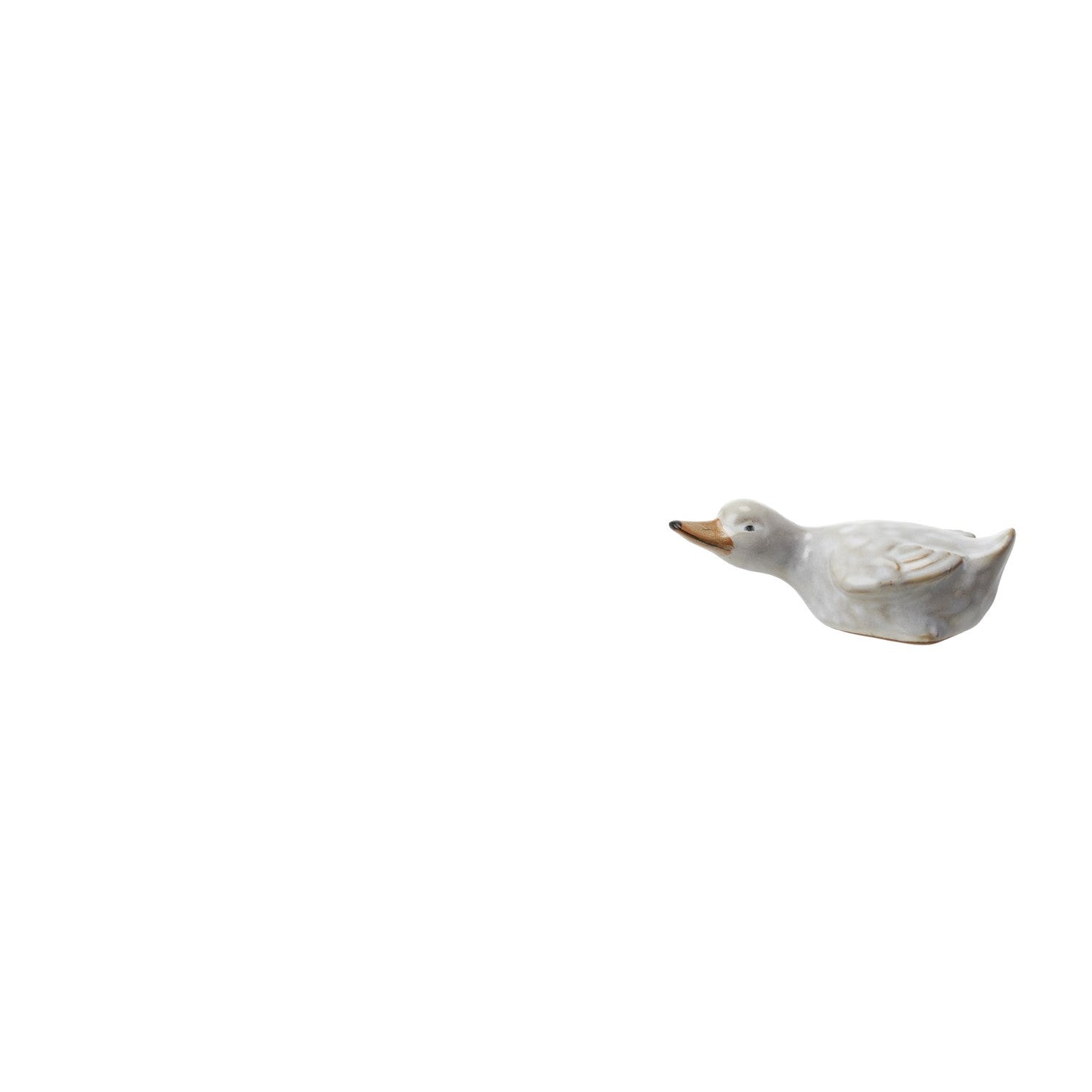 stoneware duckling laying flat