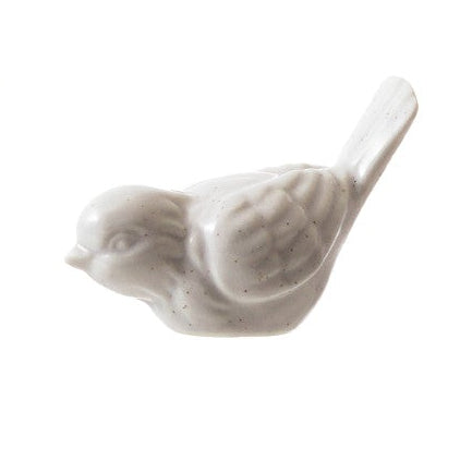 ceramic pale white bird figurine