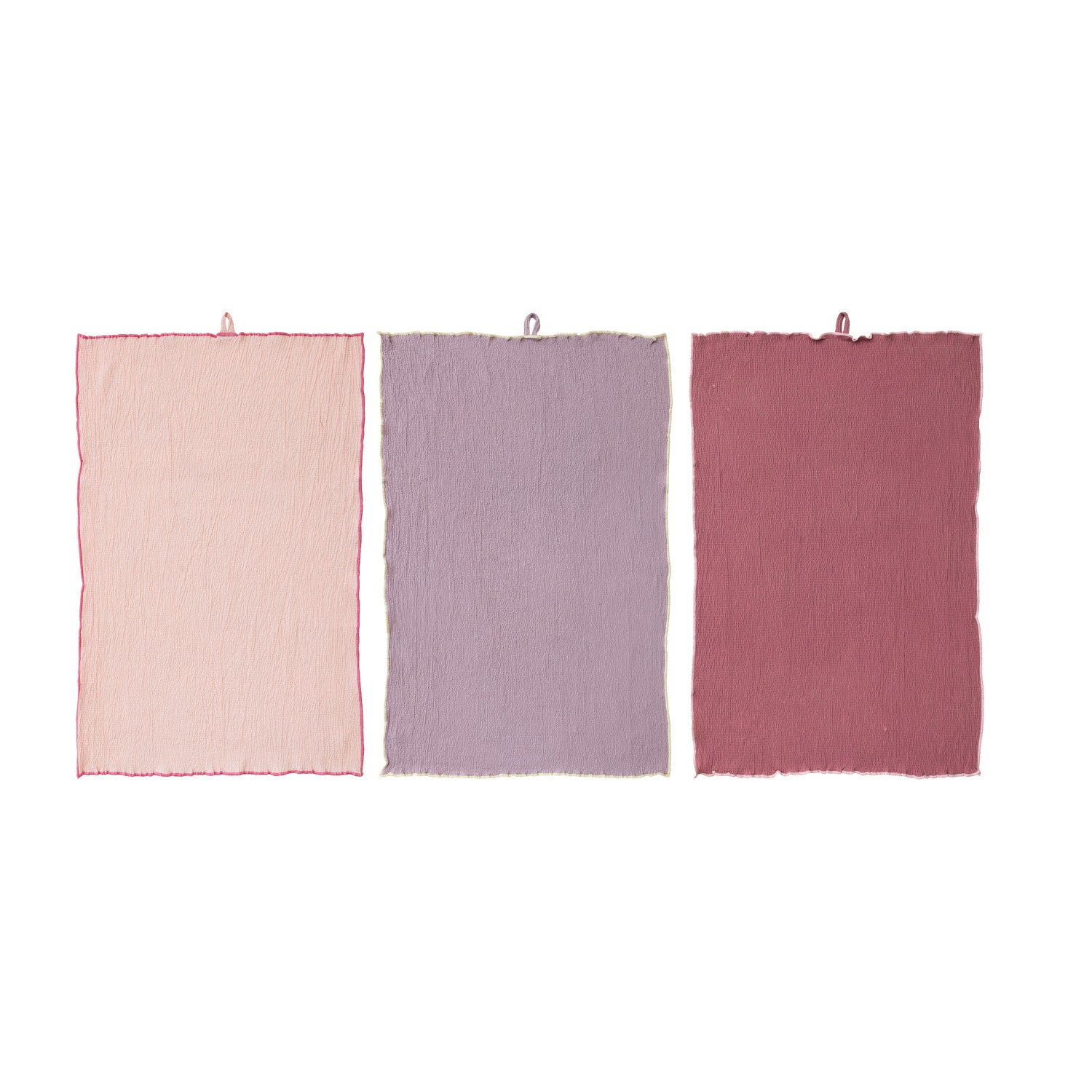 3 towels laying flat on a white background