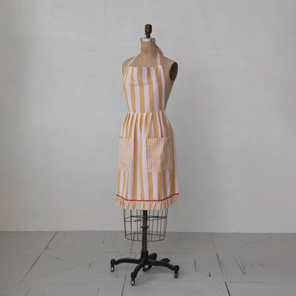 Striped apron on a mannequin against a grey background