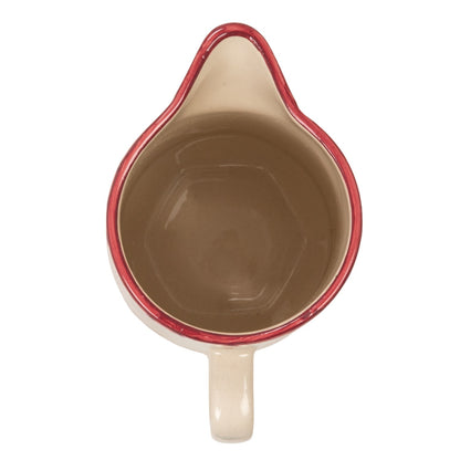 top view of An off-white ceramic pitcher  a dusty red rim 
