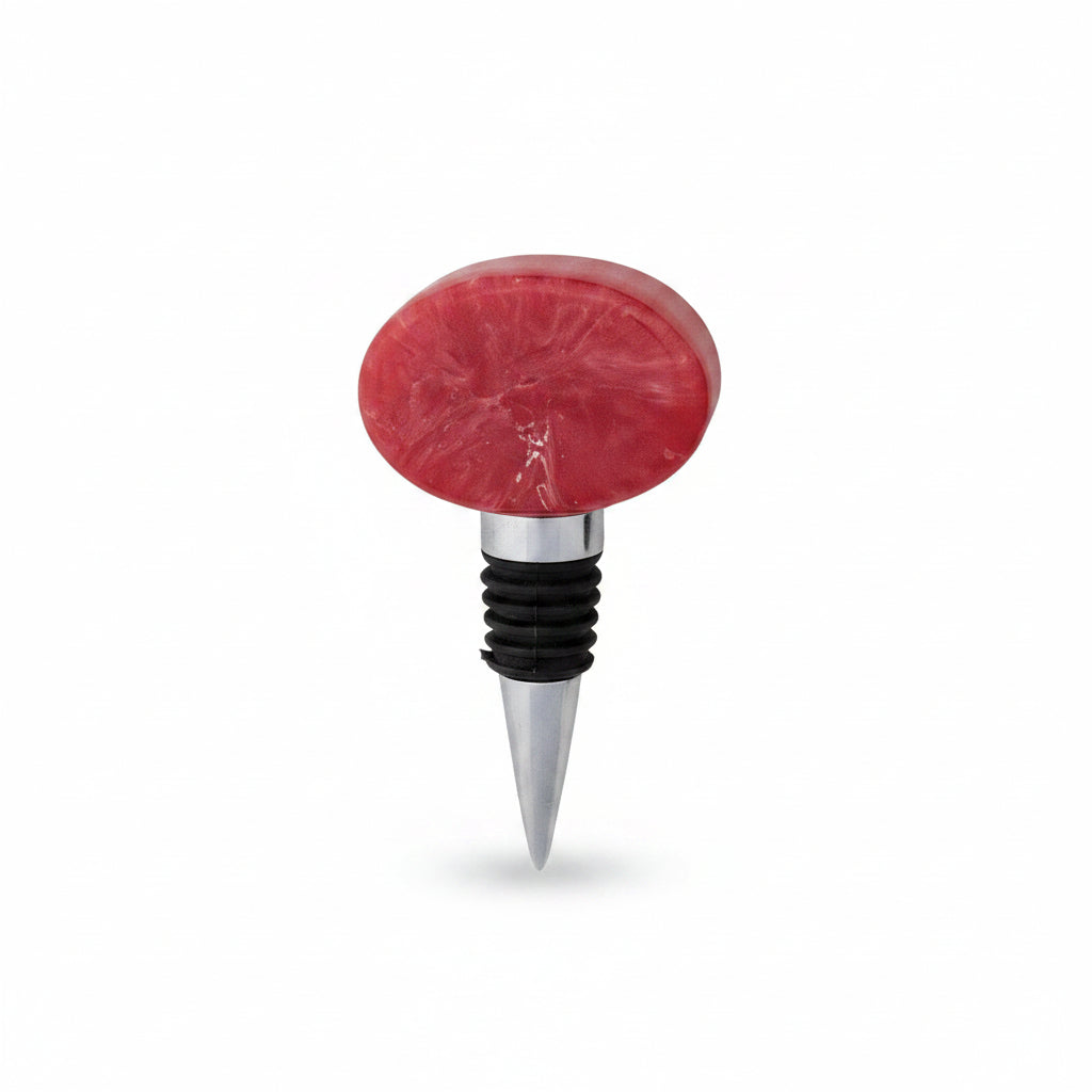bottle stopper with bright pink marbled resin top