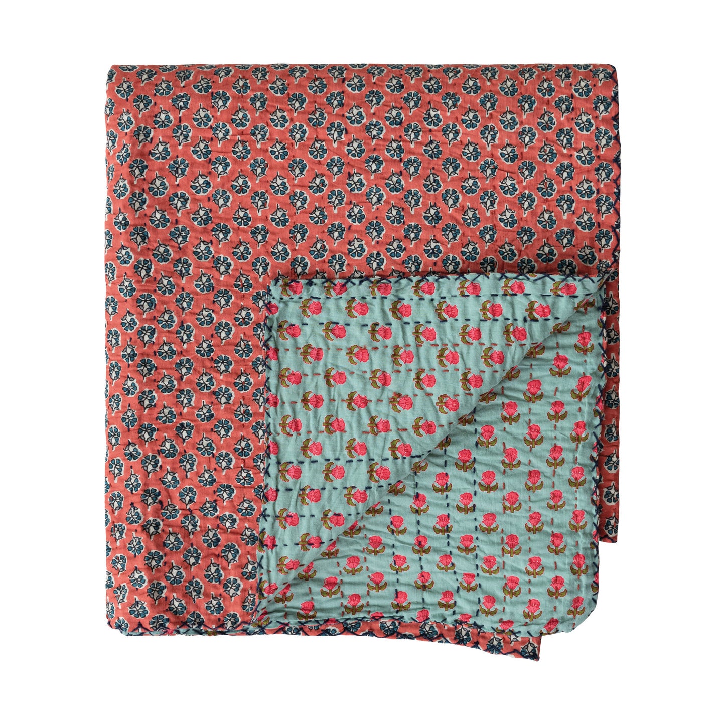 Kantha stich blanket with a corner folded to show reverse side