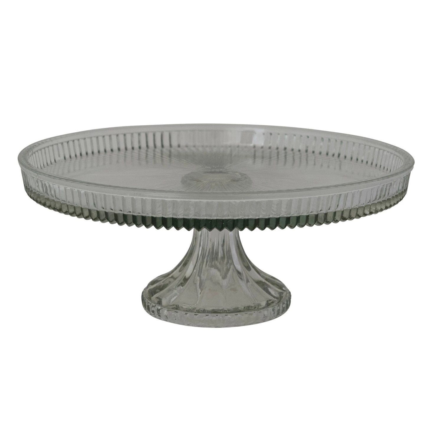 fluted glass cake stand on a white background