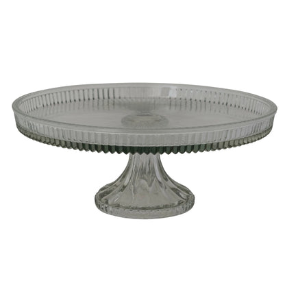 fluted glass cake stand on a white background