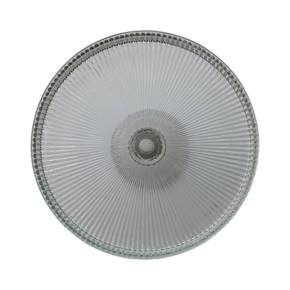 top view of glass plate with textured rim on a white background