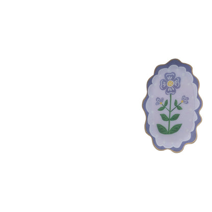 oval purple tray with bright purple floral design in the center
