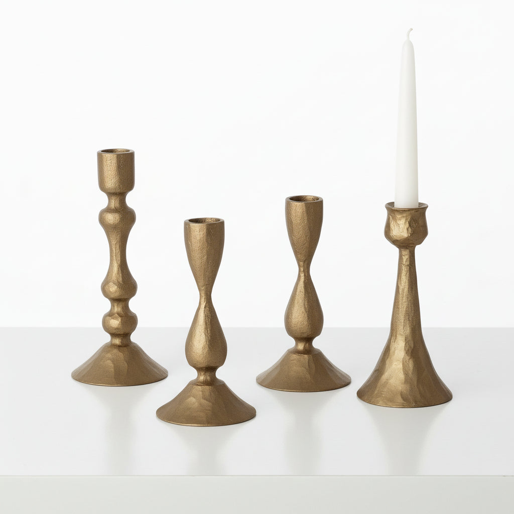 assorted taper holders on a white background