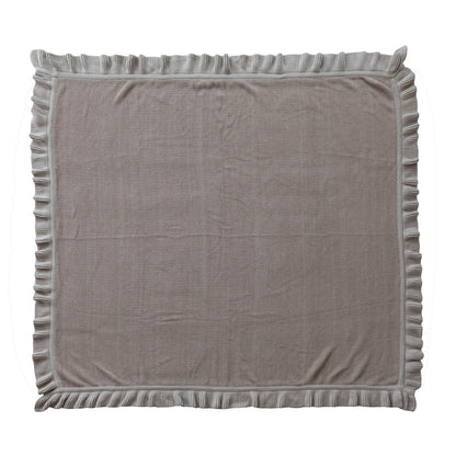 taupe Cotton Knit Throw with Ruffle laying flat on a white background