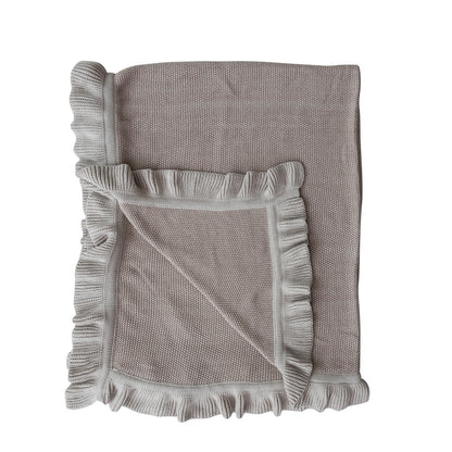 taupe Cotton Knit Throw with Ruffle folded  and shown on a white background