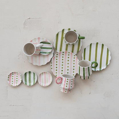 ceramic dishes with striped and polka dot patterns on a light gray background
