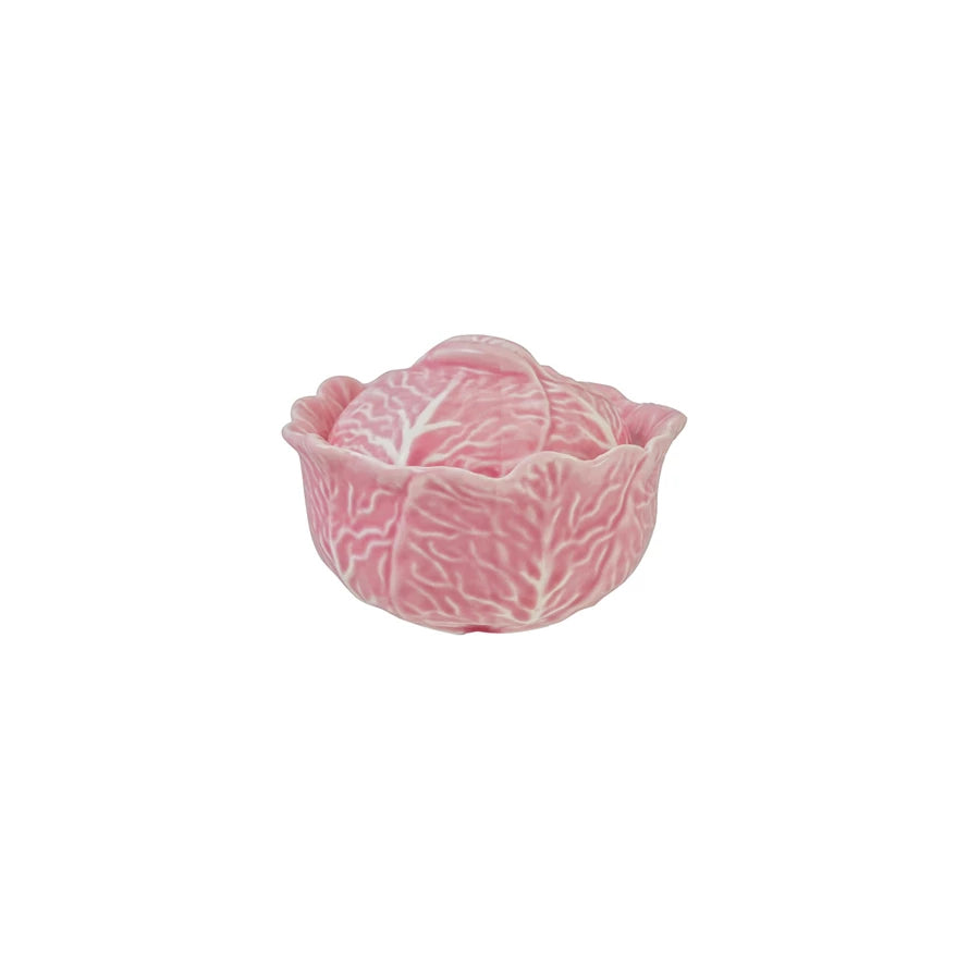 Pink ceramic cabbage-shaped baker on a white background