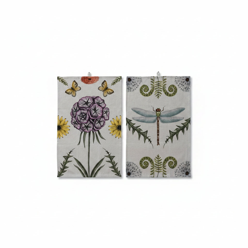 2 towels with botanical designs on a white background