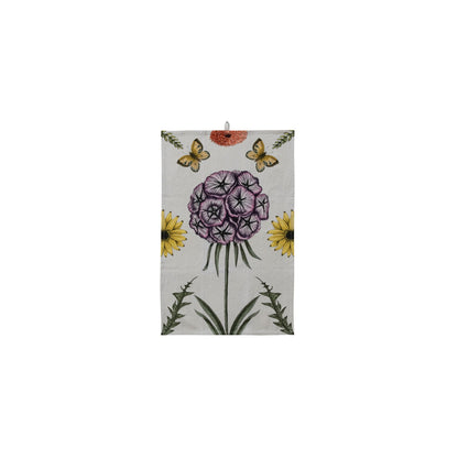 tea towel with a large purple flower in the center and other florals around it and small butterflies at the top