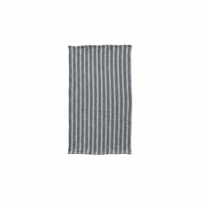 blue towel with off-white stripes laying flat on a white background