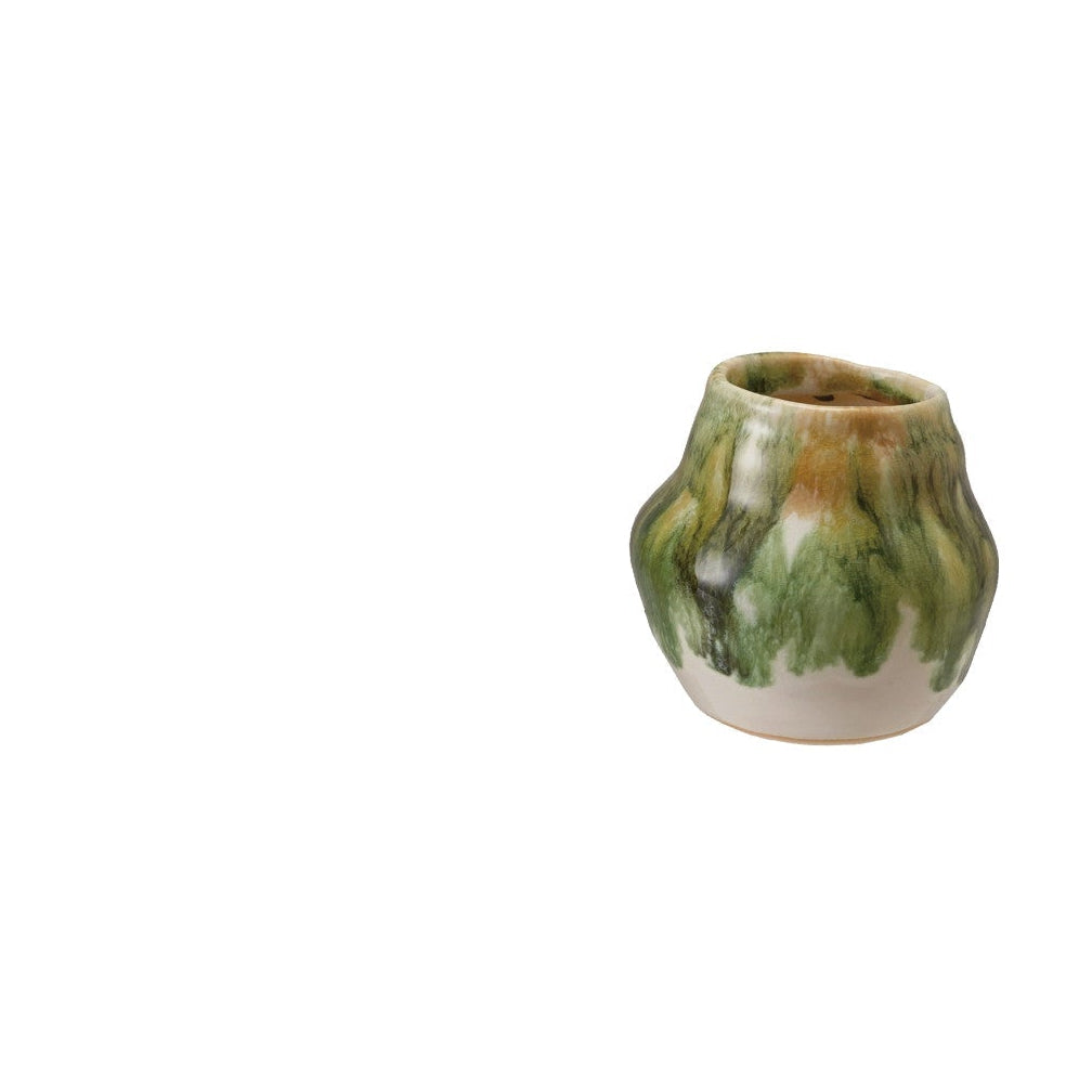 small ceramic vase with green and brown glaze on a white background