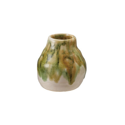medium ceramic vase with green and brown glaze on a white background