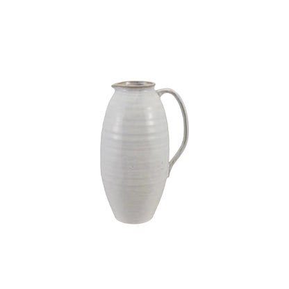 White ceramic pitcher on a white background