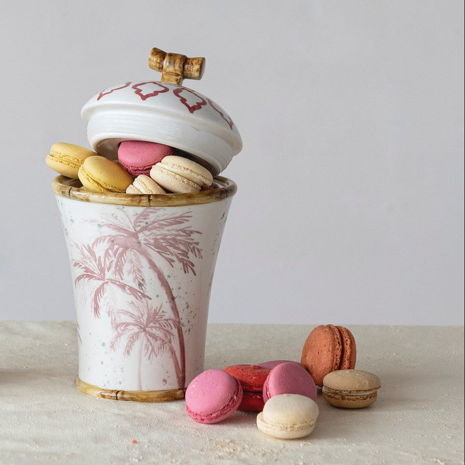 stoneware canister with macaroons in it